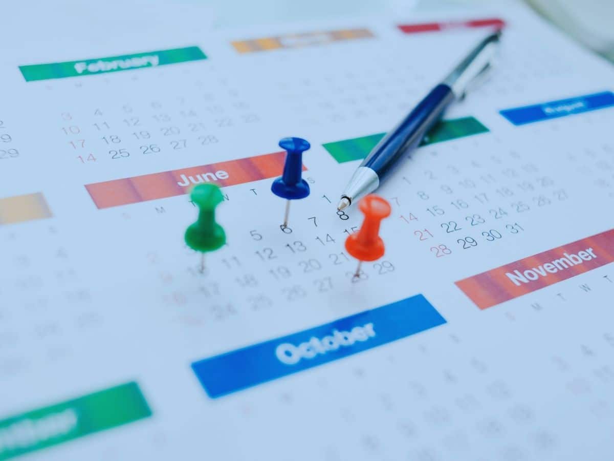 Image of calendar with pins in it, visualising how long does financial planning take